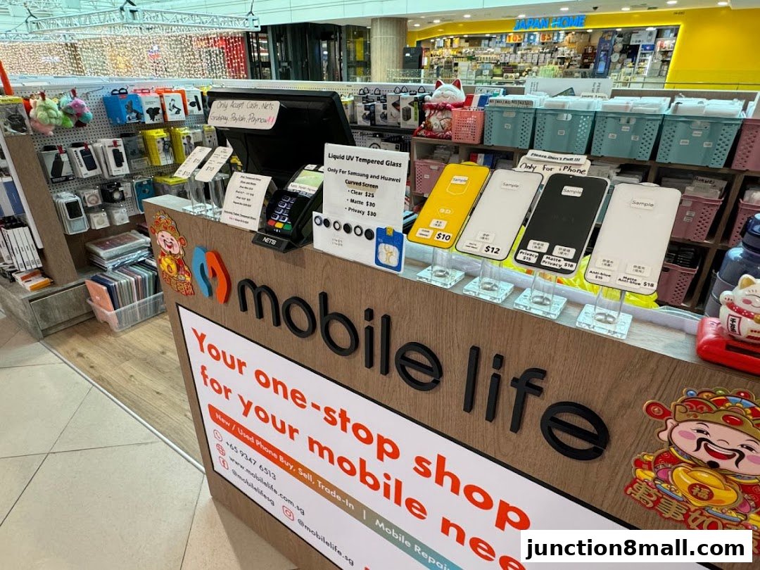 A mobile phone shop counter displaying phone accessories and repair services.