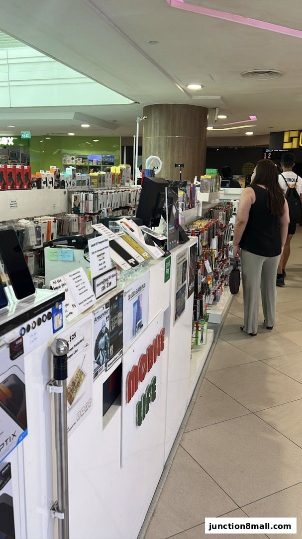 A retail shop displaying various phone accessories and repair services.