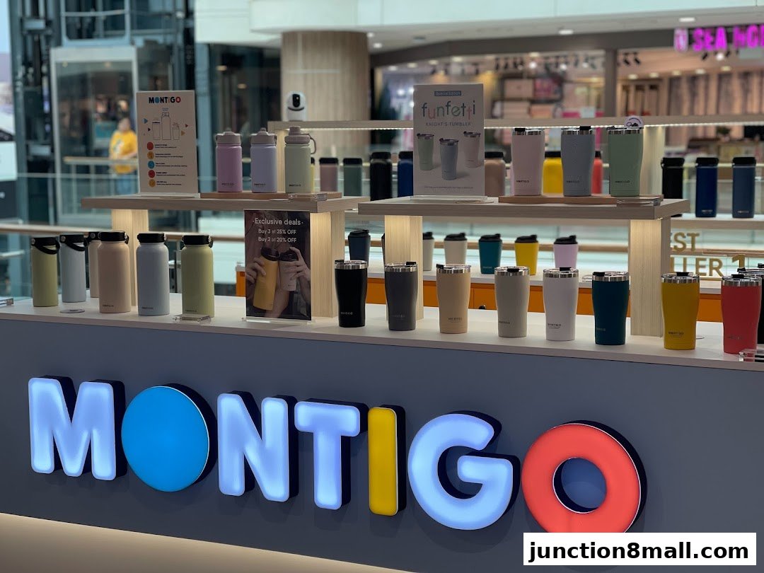 A display of colorful Montigo tumblers and water bottles in a retail store.