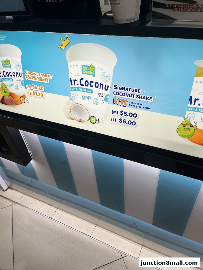 A menu display for Mr. Coconut featuring various coconut shakes and their prices.