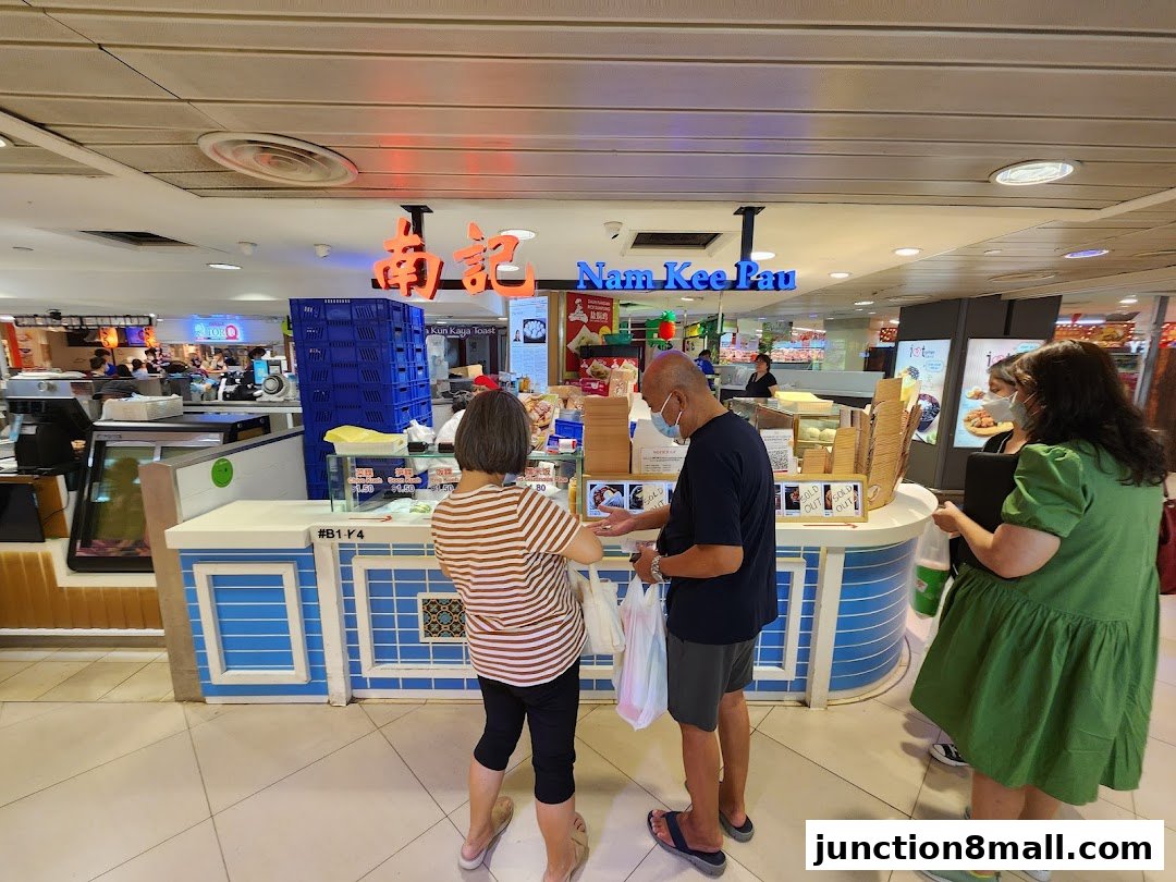 Customers ordering at the Nam Kee Pau food stall in a mall.