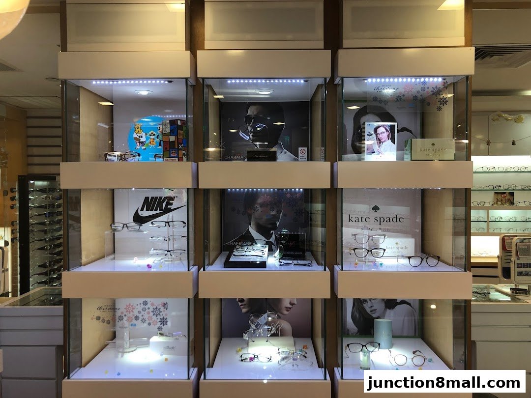 Display cases showcasing various eyeglasses and brands like Nike and Kate Spade.