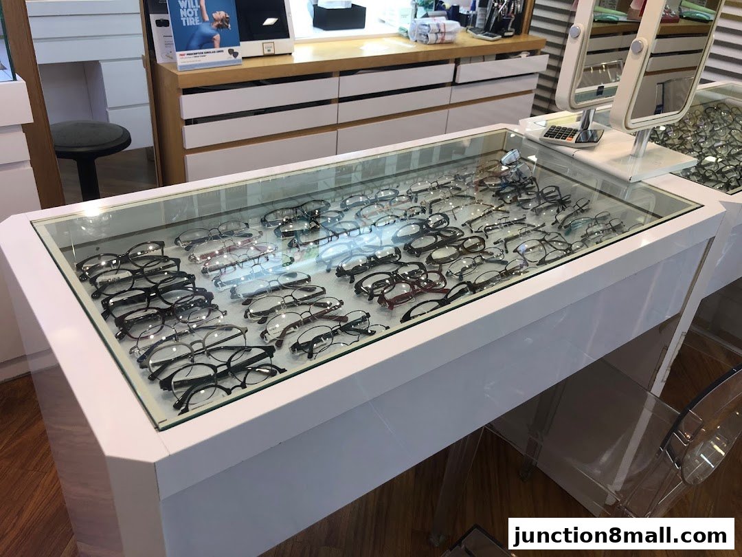 A display case filled with various styles of eyeglasses at Nanyang Optical.