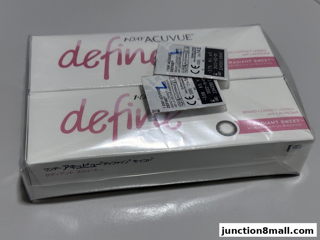 Two boxes of 1-Day Acuvue Define contact lenses, one with Radiant Sweet.