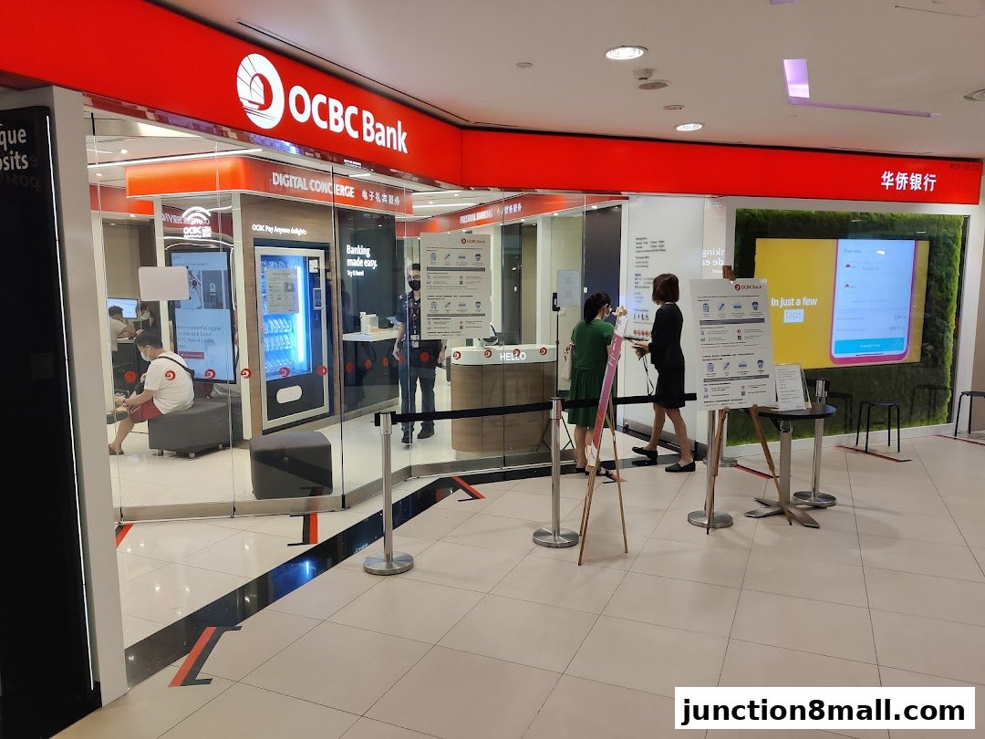The OCBC Bank branch features a digital concierge, ATM, and customer service area.
