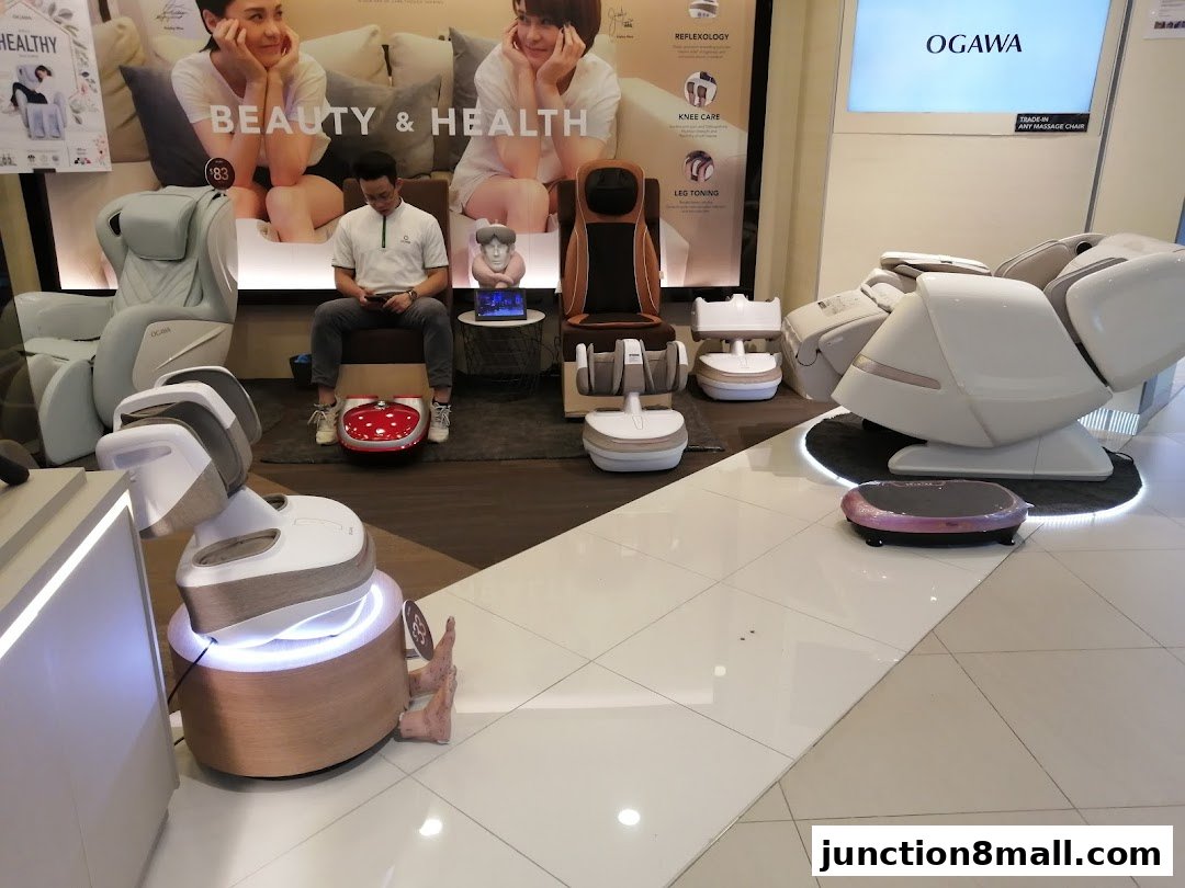 OGAWA shop interior showcasing various massage chairs and foot massagers.
