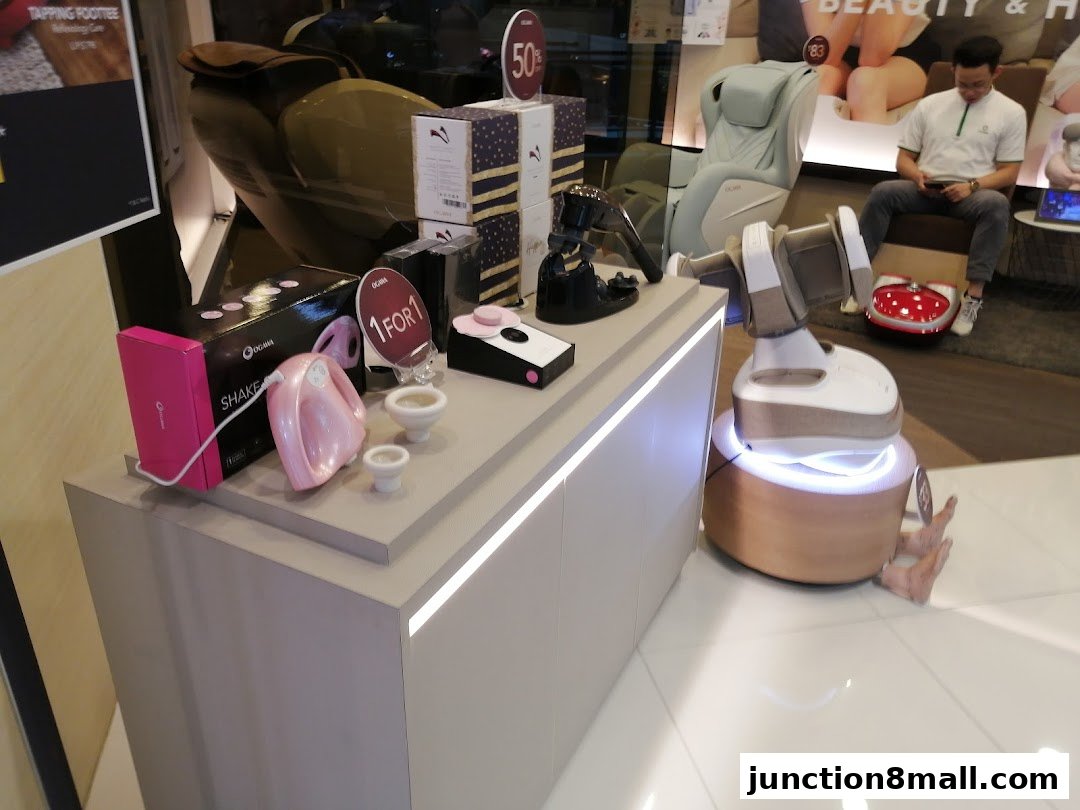 OGAWA shop interior showcasing massage chairs and wellness products.