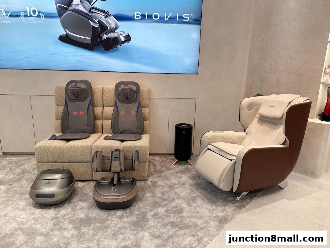 OGAWA shop interior showcasing massage chairs, foot massagers, and a display screen.