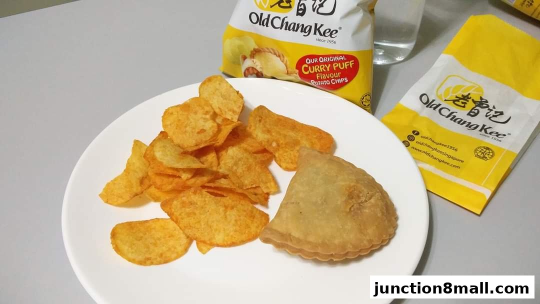 A plate of Old Chang Kee curry puff flavour potato chips and a curry puff.