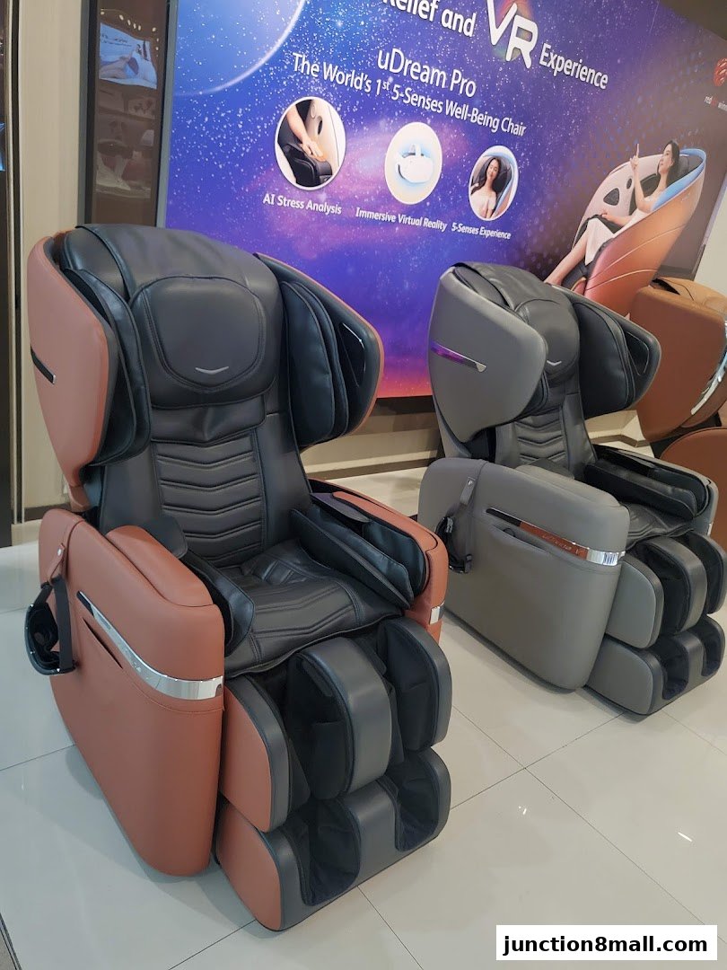 Two luxurious massage chairs are displayed in a retail store, showcasing advanced features.