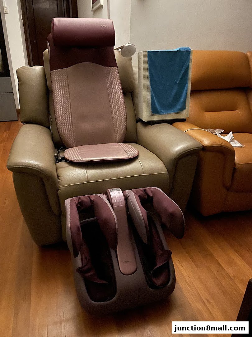 A massage chair with a foot massager and an air purifier.