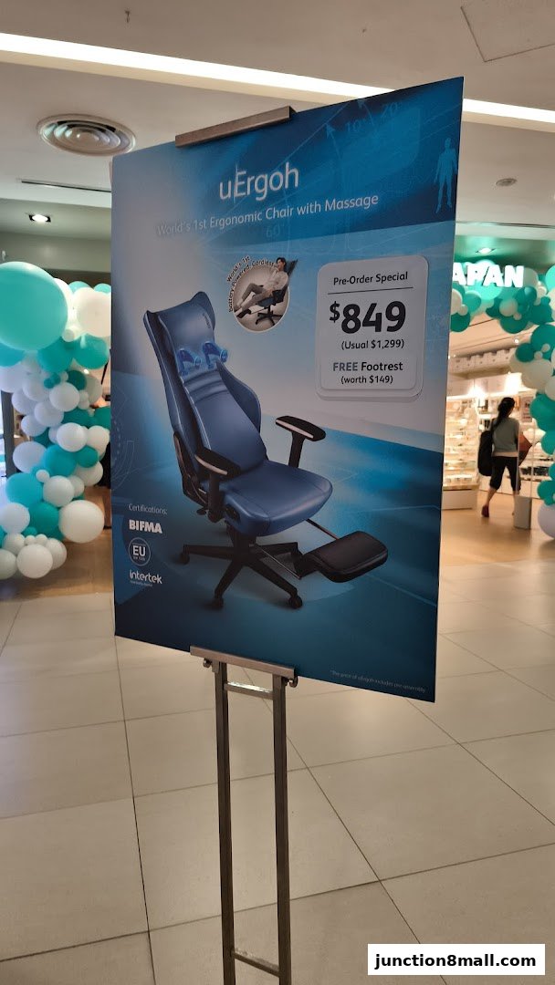 A promotional poster for the uErgoh ergonomic chair with massage feature.