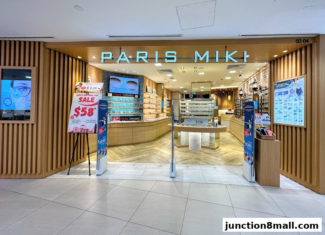 The entrance of Paris Miki, an optical shop, showcasing spectacles and promotions.