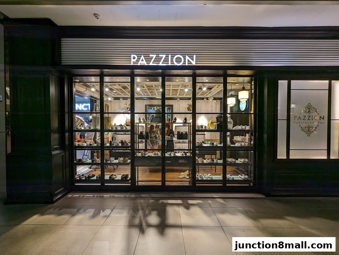 The PAZZION shoe store features a well-lit interior showcasing a variety of footwear on display shelves.