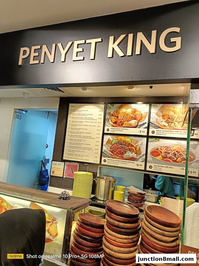 A menu board for Penyet King, showcasing various Indonesian dishes with prices and images.