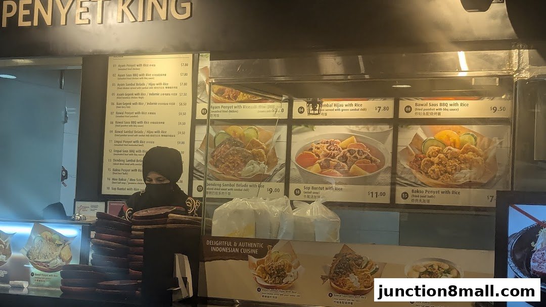 A display of Indonesian dishes with prices and images at Penyet King.