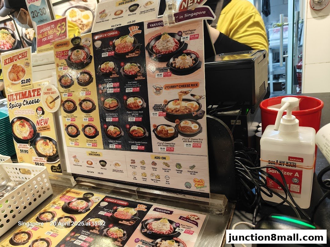 A menu display for Pepper Lunch Express featuring various rice dishes, steaks, and combos.
