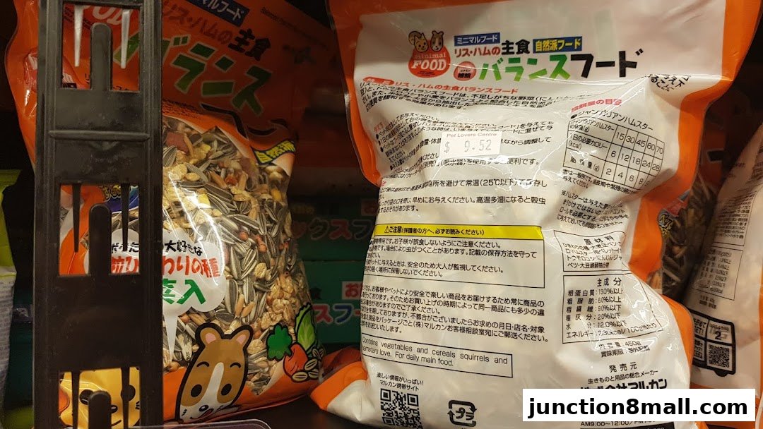 Bags of hamster food with Japanese text and nutritional information.
