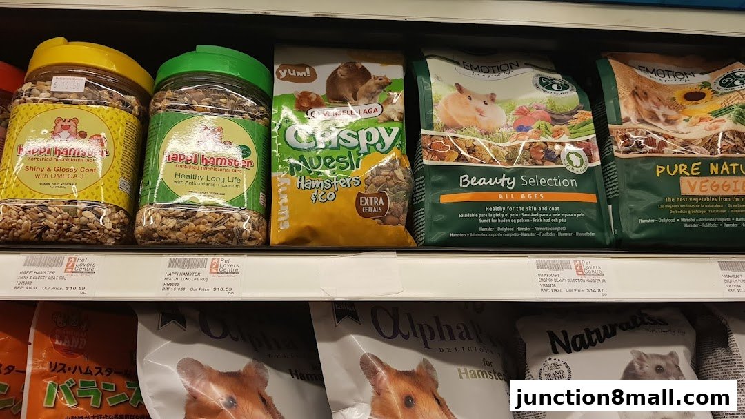 Shelves stocked with various hamster food products, including jars and bags.