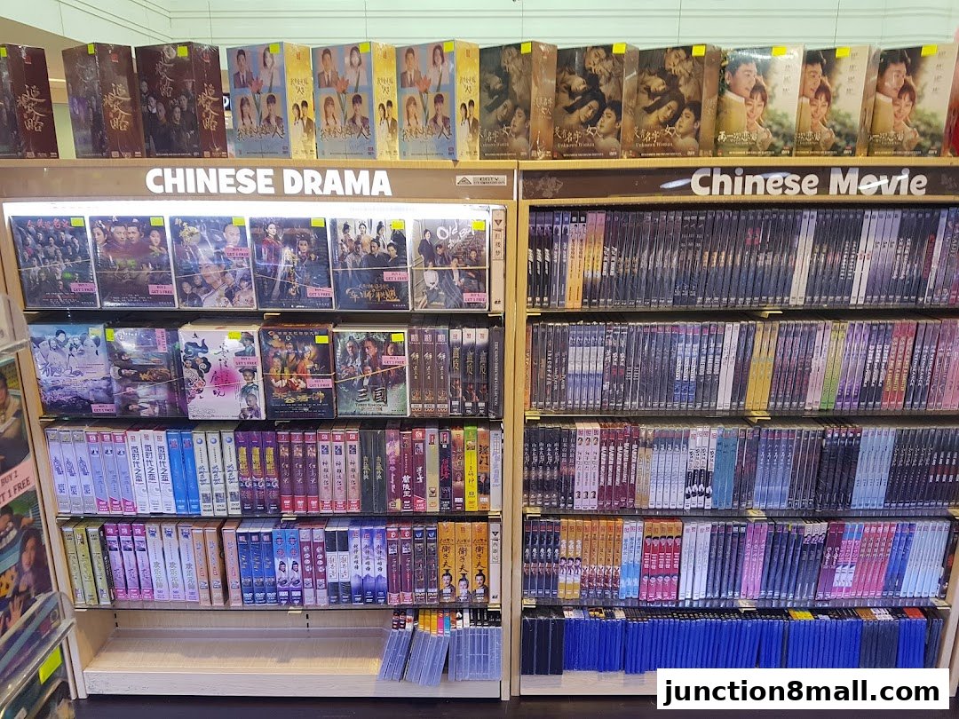 Shelves filled with DVDs of Chinese dramas and movies, neatly organized.