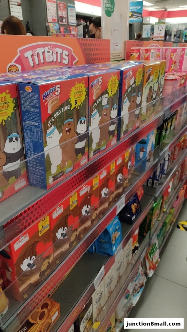 Shelves stocked with various snack boxes featuring cartoon characters and promotional stickers.