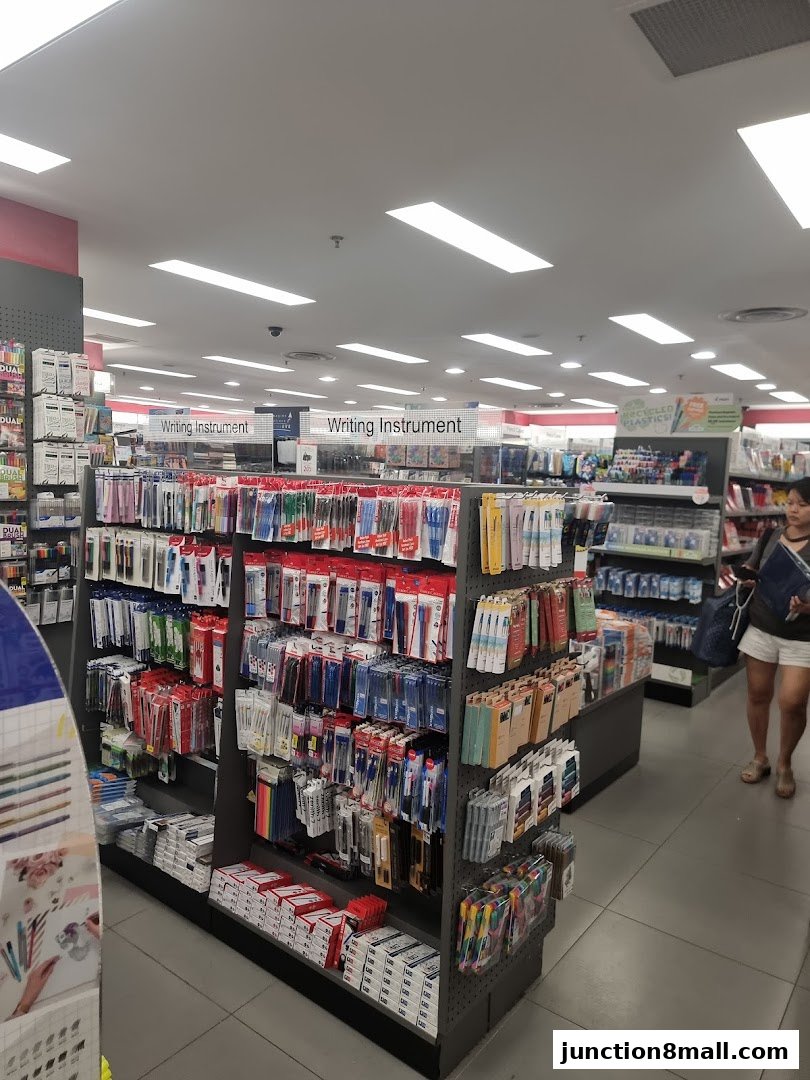 Interior view of a POPULAR Bookstore, showcasing a wide selection of writing instruments.