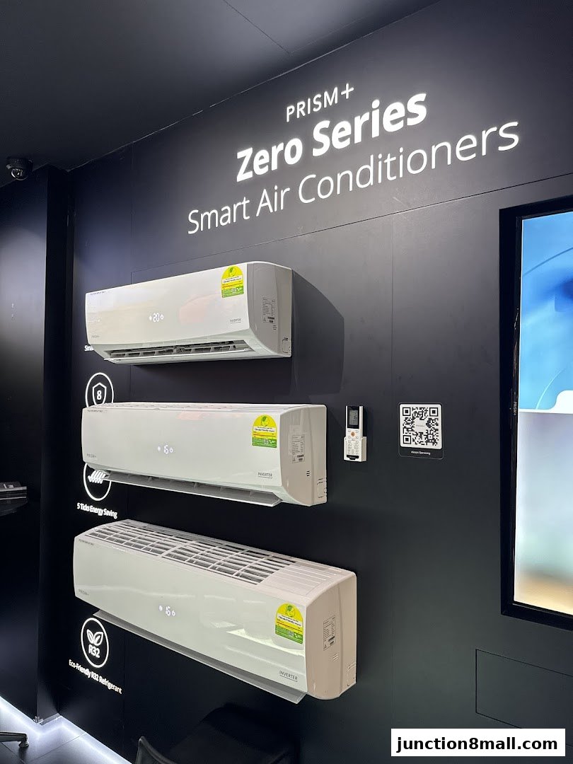PRISM+ Zero Series Smart Air Conditioners displayed on a black wall with product features highlighted.