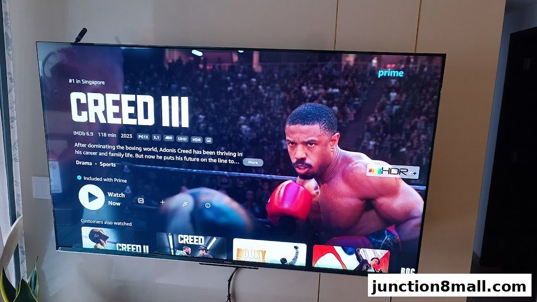 A television screen displaying the movie Creed III with streaming service information.