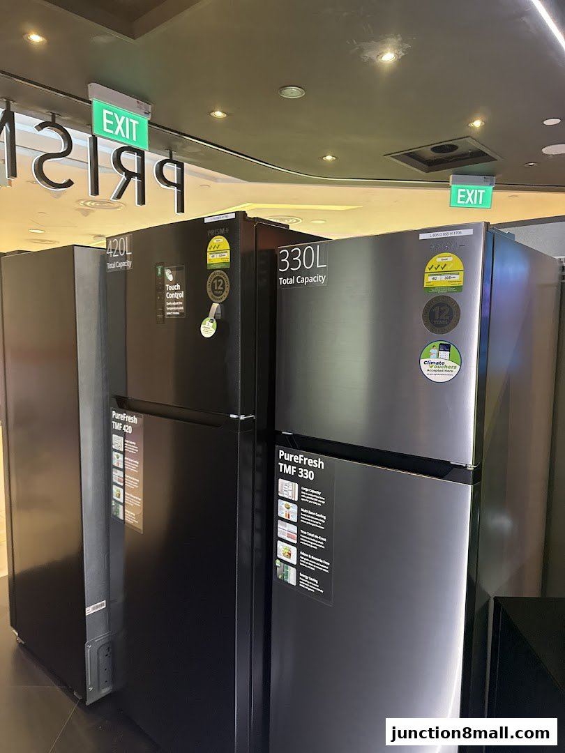 Two refrigerators, one black and one silver, are displayed with their features highlighted.
