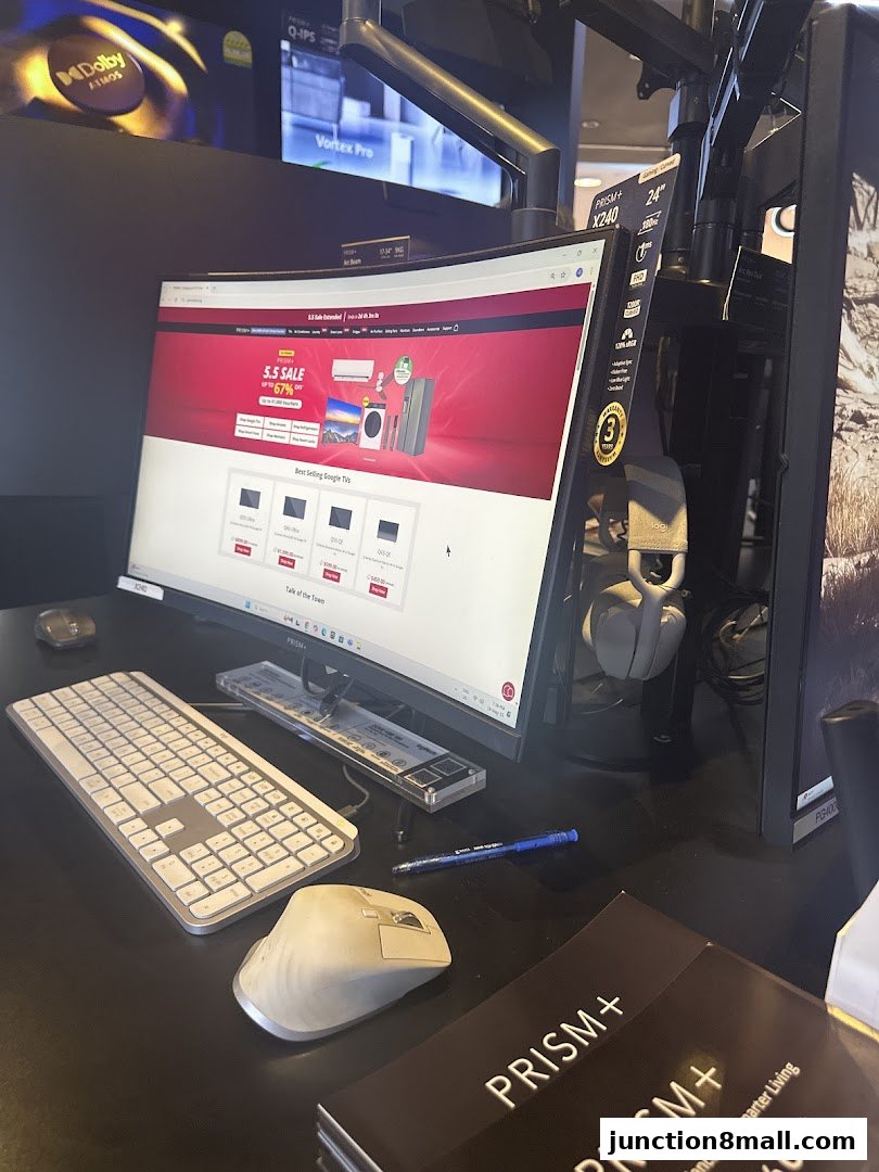 A computer setup displaying a sale on Google TVs and other appliances.