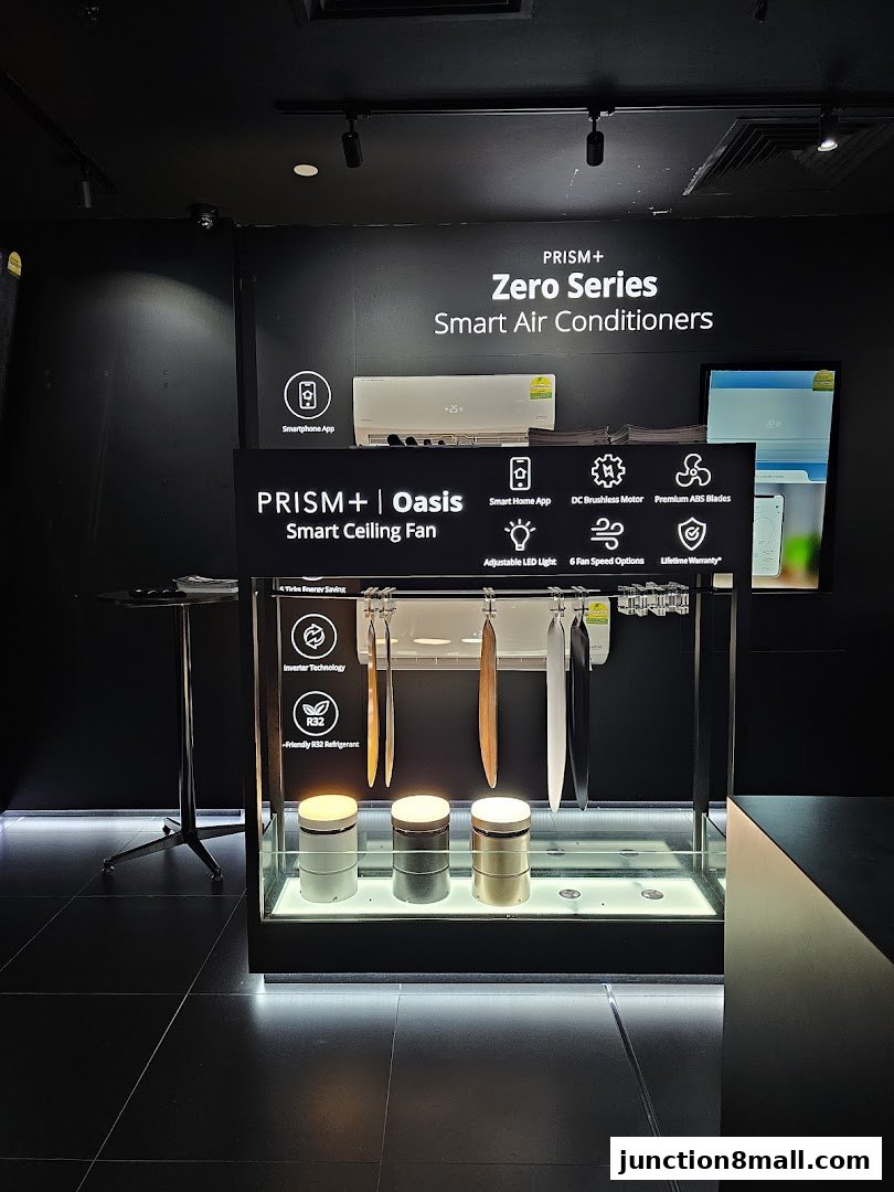 Display of PRISM+ smart air conditioners and ceiling fans with product features highlighted.