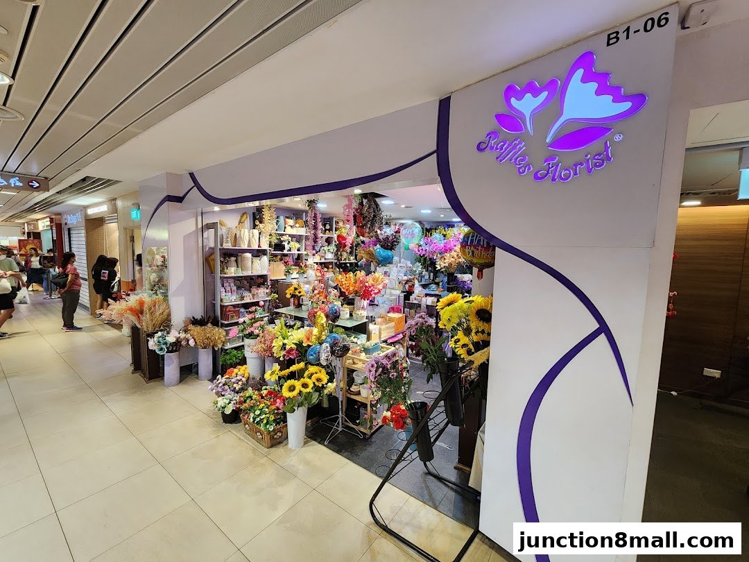 A vibrant florist shop displaying a wide variety of colorful flowers and decorative items.