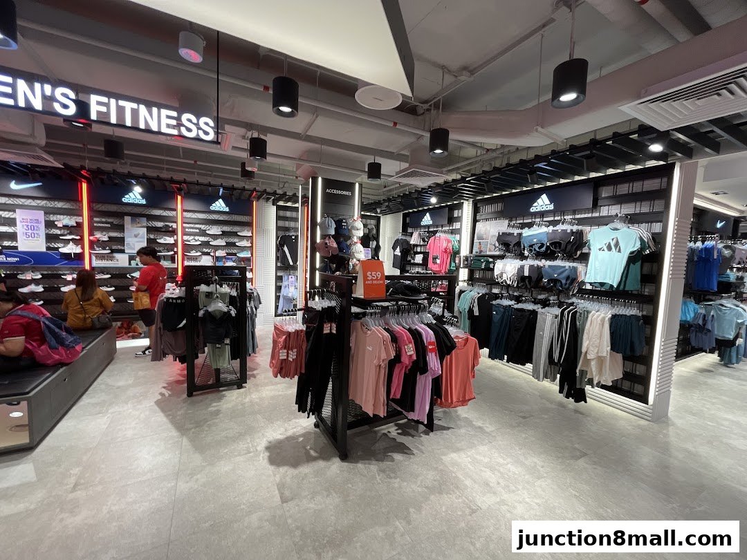 Interior view of a Royal Sporting House store showcasing athletic apparel and footwear.
