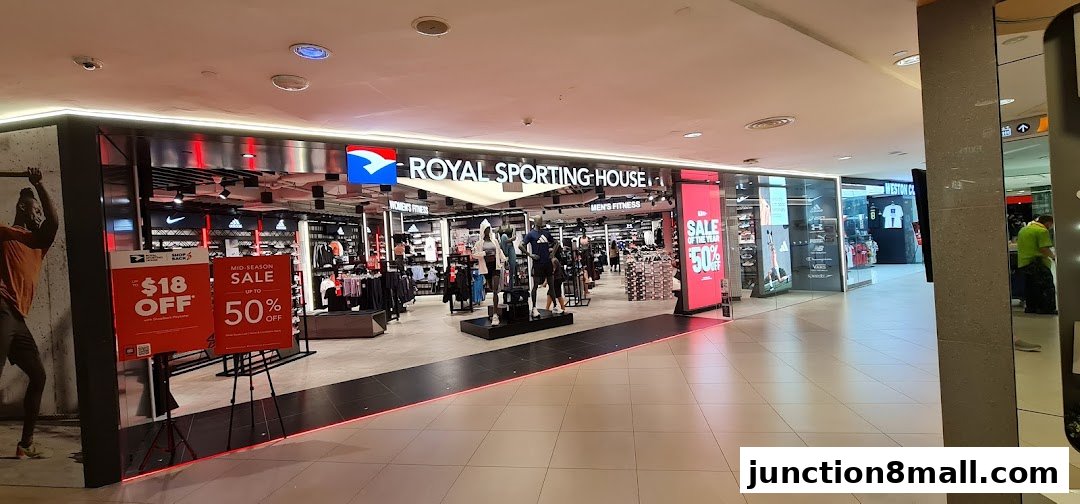 The exterior of the Royal Sporting House store, showcasing athletic apparel and footwear with sale signage.