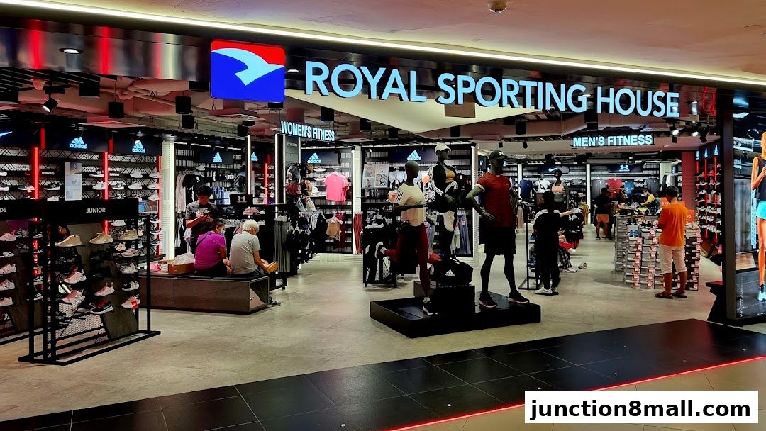Interior view of Royal Sporting House, showcasing athletic apparel and footwear with mannequins.
