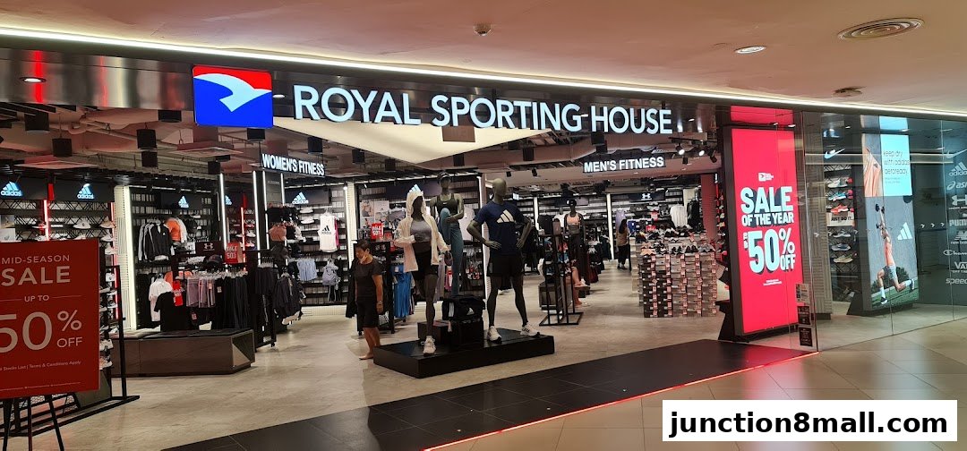 The Royal Sporting House store features a mid-season sale with up to 50% off, displaying athletic apparel and footwear.