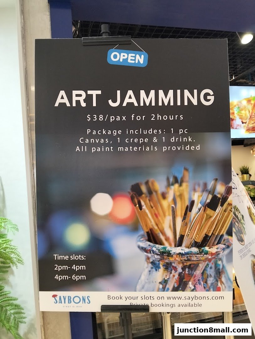 A sign advertising an 'Art Jamming' event with details on package, price, and time slots.