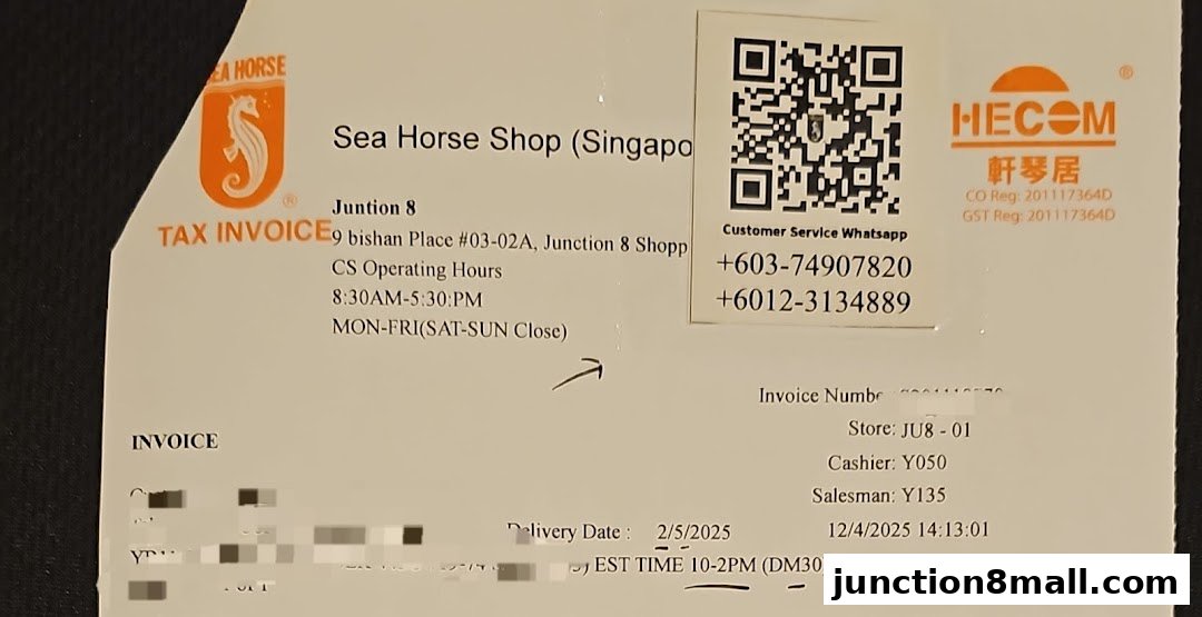 A tax invoice from Sea Horse Shop at Junction 8, including operating hours and contact details.