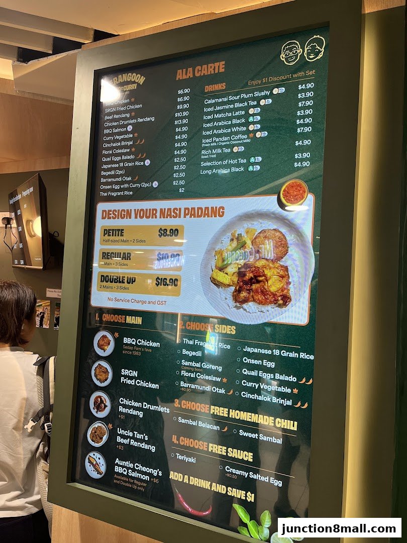 A menu board for Serangoon BBQ Curry Nasi Padang with various dishes and prices.