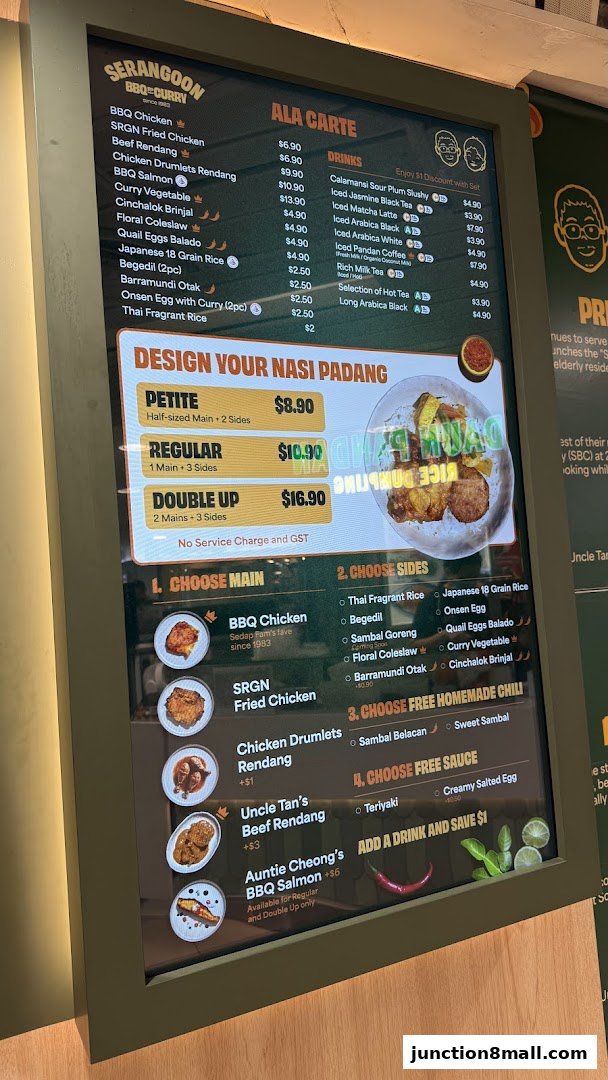 A digital menu board displaying a variety of BBQ, curry, and nasi padang dishes with prices.