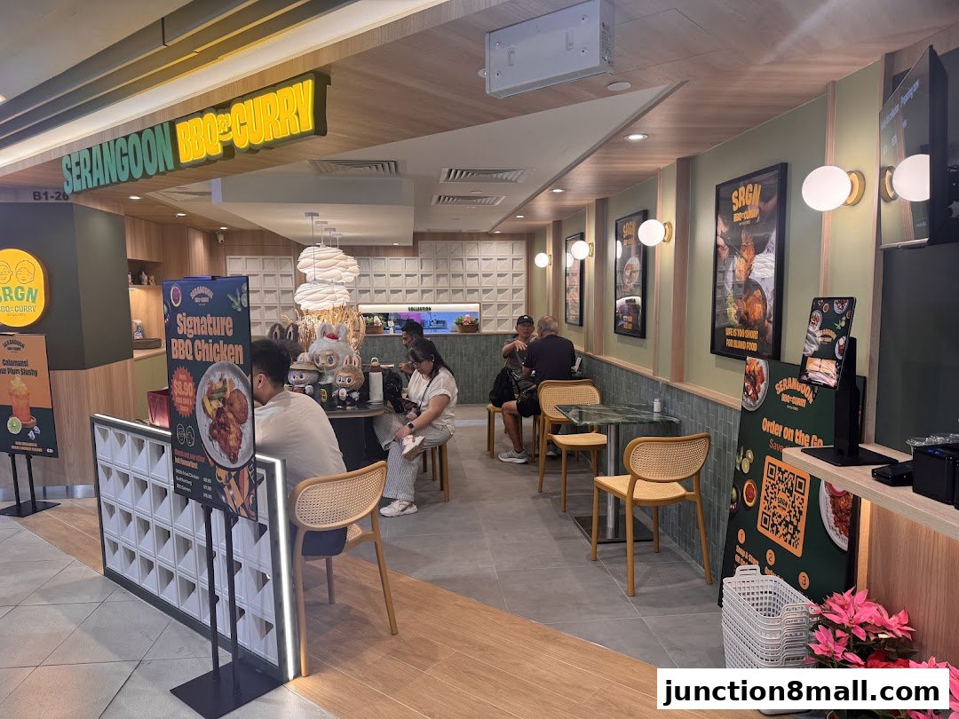 Interior view of Serangoon BBQ & Curry Nasi Padang restaurant with customers dining.