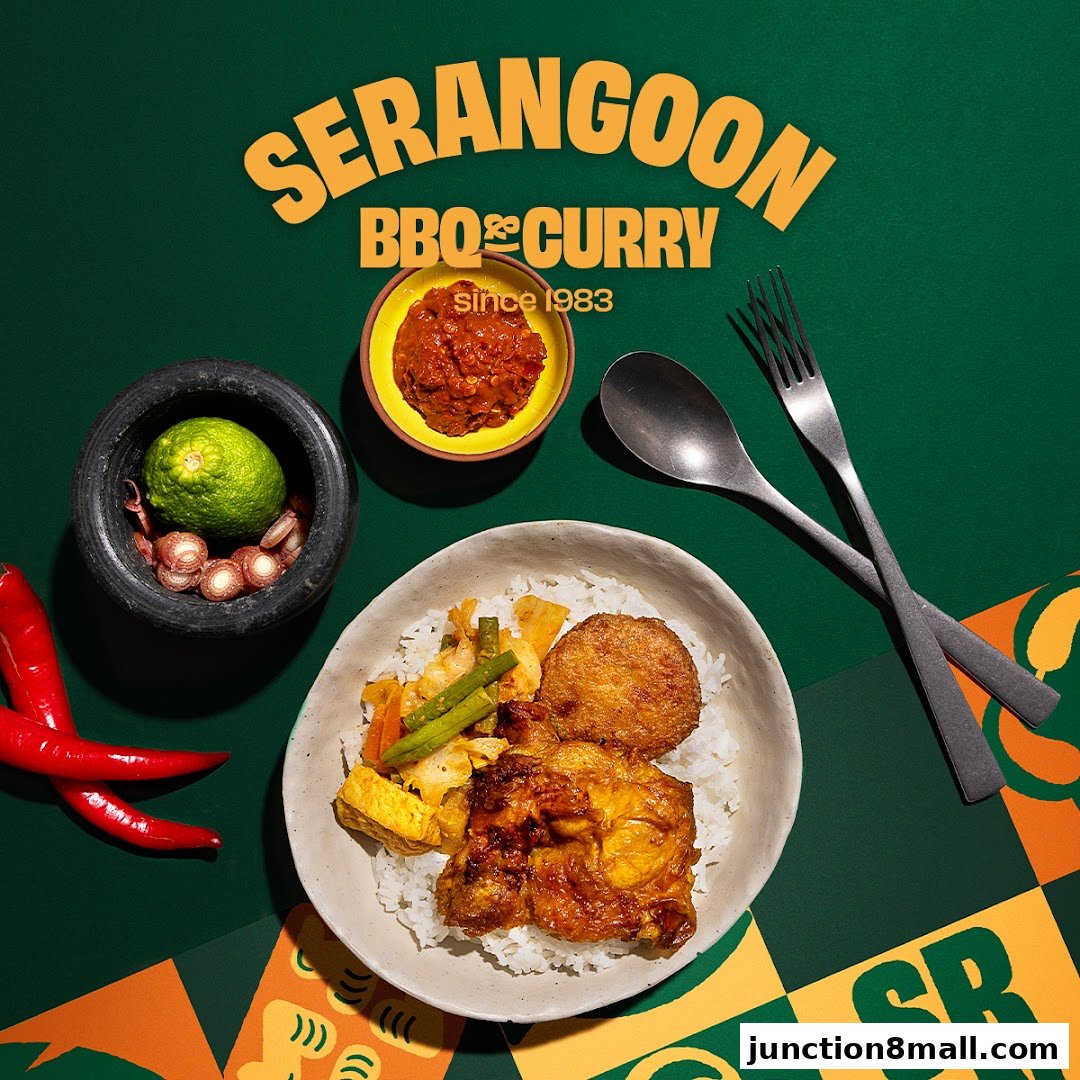 A delicious bowl of rice with chicken, vegetables, and a side of sambal, presented with fresh ingredients.