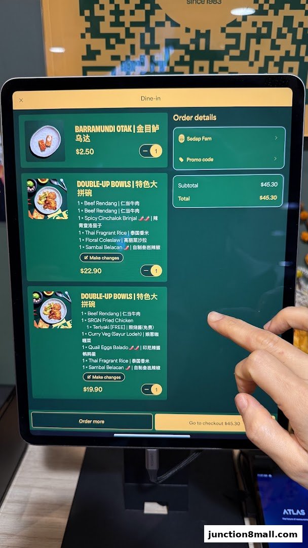 A tablet displays a food ordering interface with various dishes and prices.