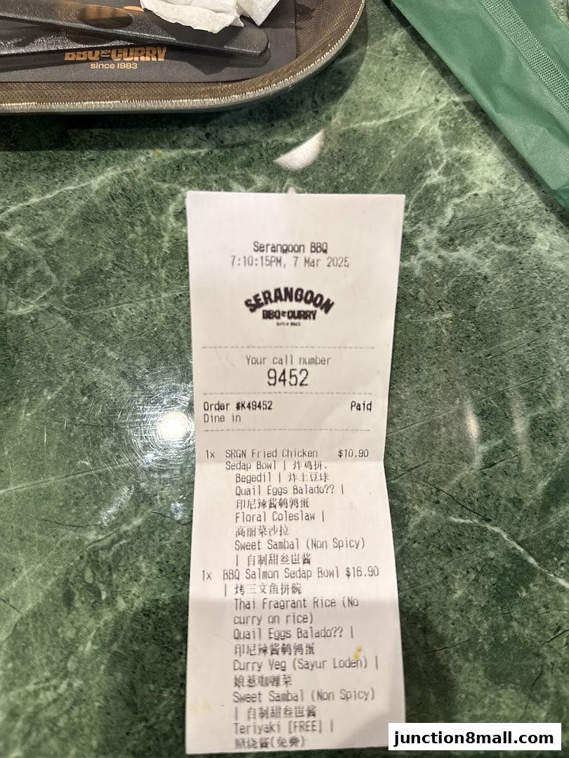 A receipt from Serangoon BBQ & Curry showing ordered items and prices.
