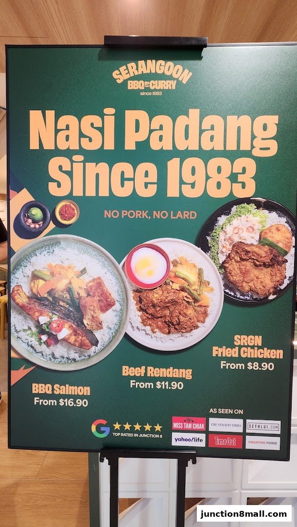 A menu board showcasing Nasi Padang dishes like BBQ Salmon, Beef Rendang, and Fried Chicken.