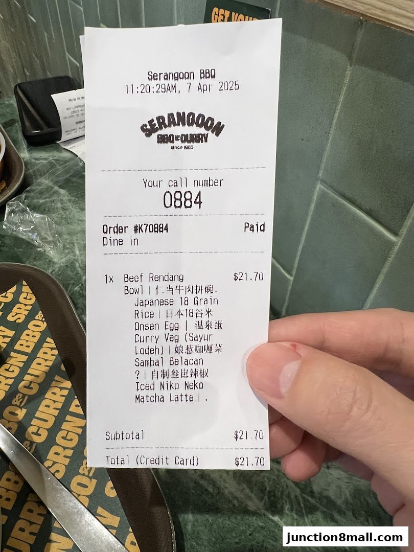 A receipt from Serangoon BBQ & Curry showing a meal order and total cost.