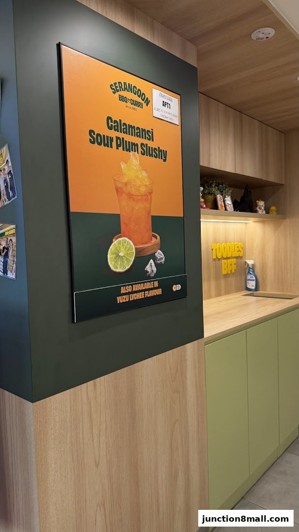 A promotional poster for a Calamansi Sour Plum Slushy from Serangoon BBQ & Curry.