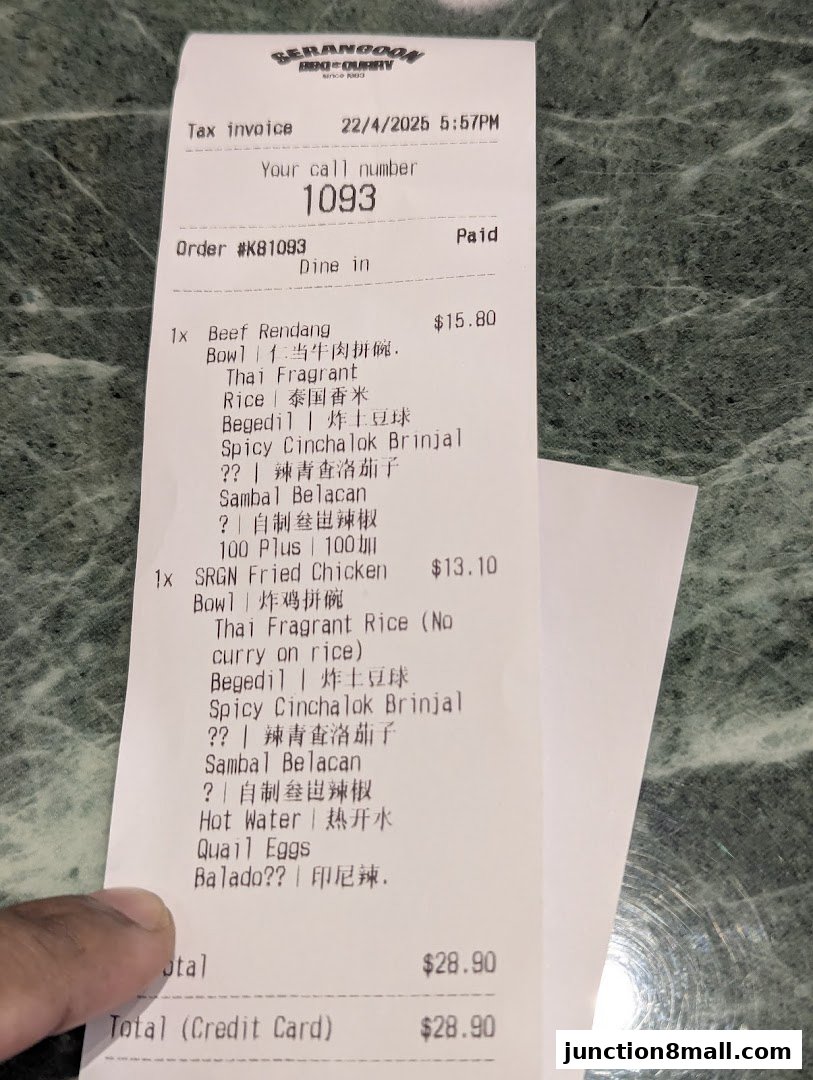 A receipt from Serangoon BBQ Curry showing two orders and a total amount.