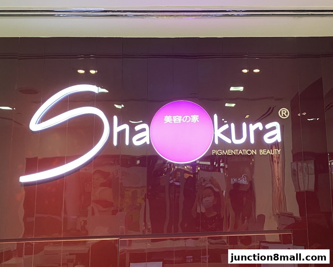 The Shakura Pigmentation Beauty shop front with a prominent neon sign.