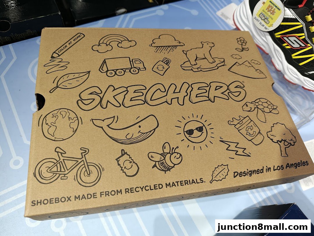 A Skechers shoebox with playful, eco-themed drawings and the brand logo.